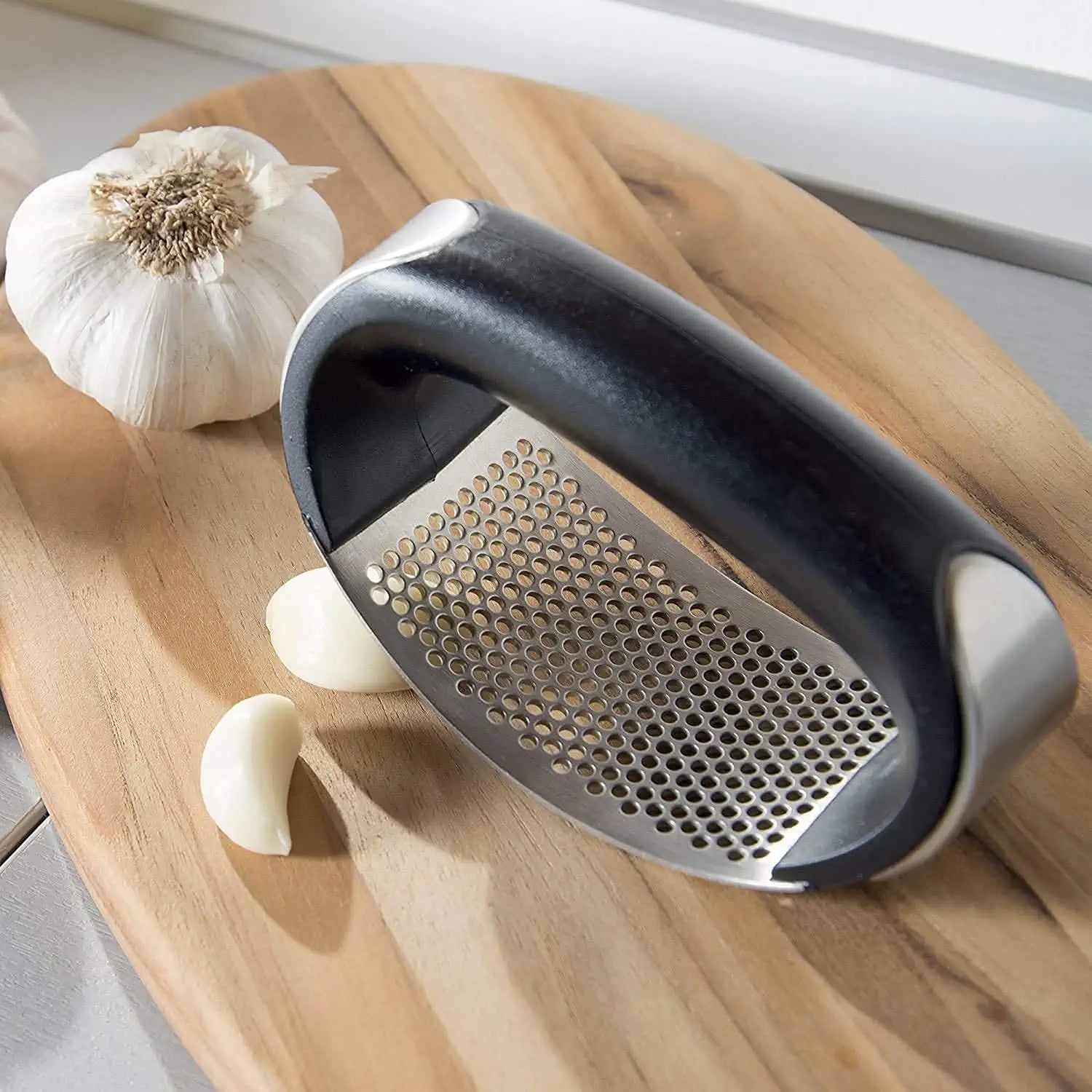 VEGETABLE PRESS™ | STAINLESS STEEL MANUAL PRESS FOR GARLIC AND VEGETABLES.