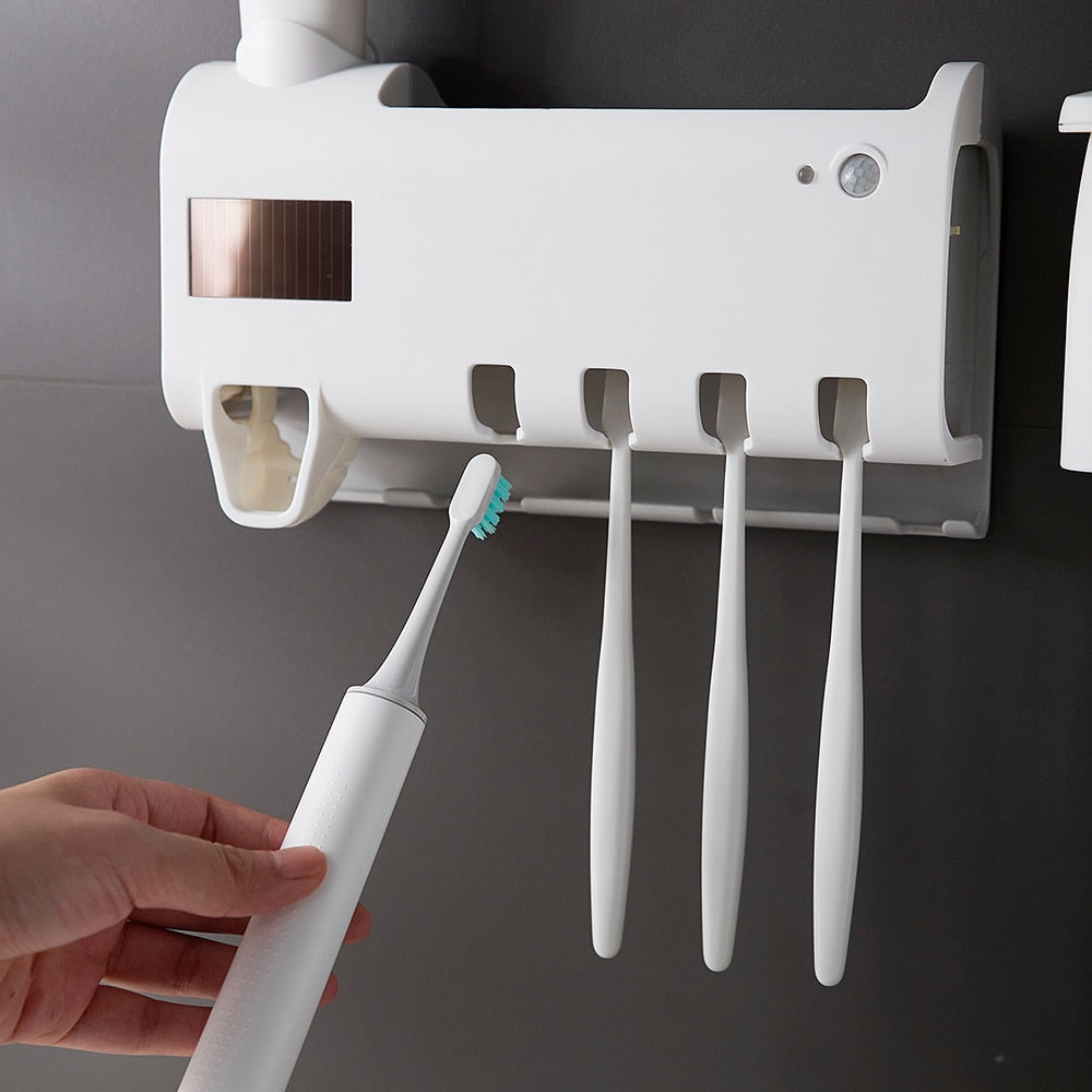 DENTICLEAN-TOOTHPASTE DISPENSER AND TOOTHBRUSH STERILIZER